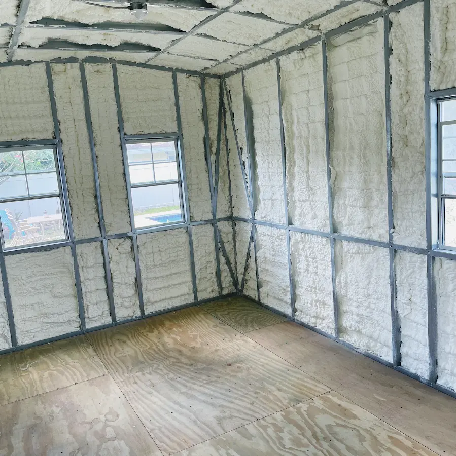 Closed-cell spray foam insulation applied to wall cavities in a residential project in Zion